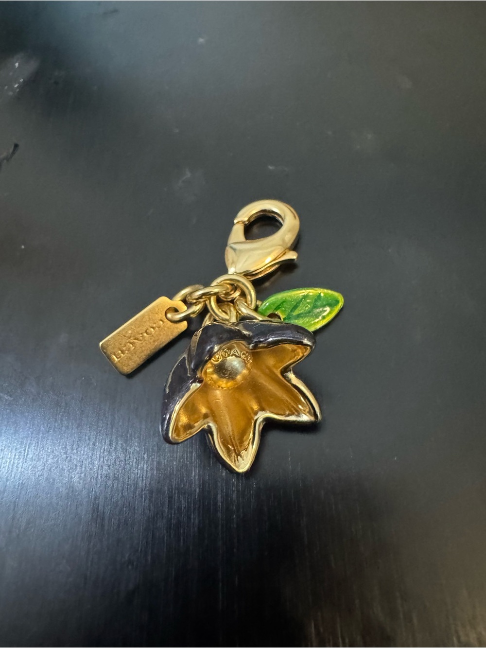 Coach Gold-Tone Bellflower Bracelet Charm with Purple and Green Enamel
